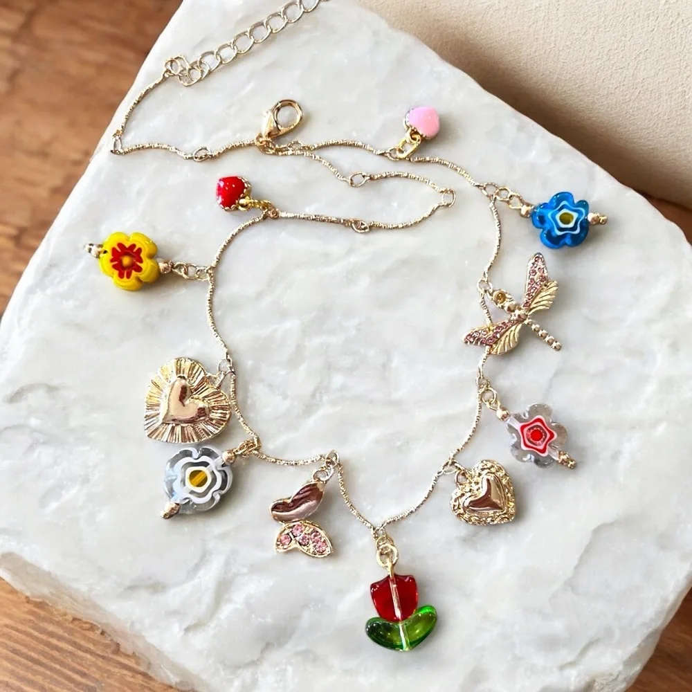 Gold and Red toned Charm Necklace glass rhinestones enamel tulip flower hearts